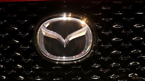 who makes mazda|Mazda North America names Tatsuro Omura as CFO .